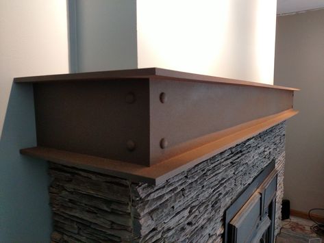 Faux Steel I-Beam Fireplace Mantle with Rivet Detail. stoneylakedesignco@gmail.com I Beam Mantel, Steel Beam Fireplace Mantel, Steel Mantel Fireplace, Metal Fireplace Mantle Ideas, Steel I Beam Ideas, Steel Fireplace Mantle, Industrial Fireplace Mantle, Metal Mantle Fireplace Mantels, Faux Steel Beams Diy