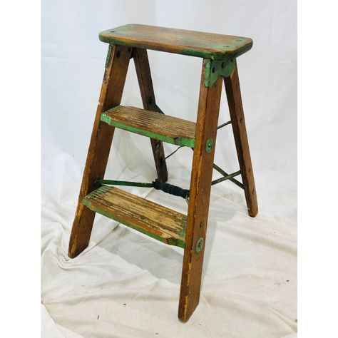 Stunning Antique Rustic European Wooden Step Stool Side Table with Original Kelly Green Painted Finish and Fold Up Metal Handle / Frame. Perfect as a funky and unexpected side table in a narrow space. Original finish fittings and frame. Gorgeous patina and age and worn green painted finish. Solid wood. Sure to add interest to any Eclectic or Traditional abode.   Approx Measurements  (When folded out)  14.75W 19D 23H Vintage Wood Chair, Book Bus, Rustic European, Vintage Lampshades, Stool Makeover, Stool Side Table, Stool Table, Vintage Booth Display, Wooden Step Stool