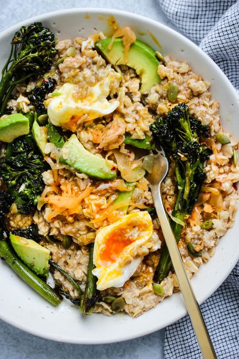 This savoury kimchi oatmeal is a delicious vegetarian meal that can be enjoyed for breakfast, lunch, or dinner. It's made with rolled oats, avocado, broccolini, eggs, and kimchi, but it's can easily be adapted to what you have on hand. It’s simple, healthy, and ready in under 25-minutes! #savoryoatmeal #pantrymeal #easyrecipe #kimchi Breakfast With Kimchi, Kimchi Oatmeal, Kimchi Eggs Breakfast, Kimchi Breakfast Ideas, Kimchi Lunch, Season Quinoa, Kimchi Breakfast, Lunch Ideas To Pack, Walder Wellness