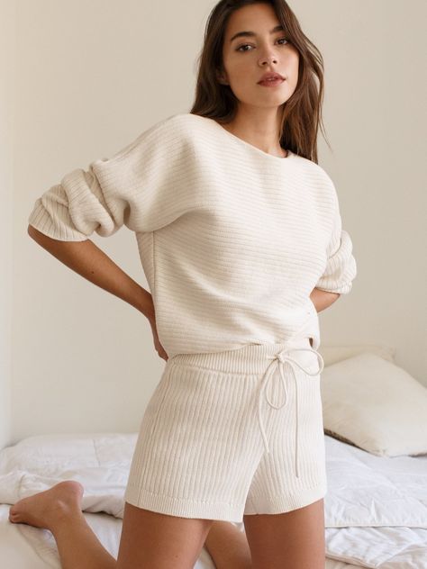 Relax in Reformation’s Two-Piece Lounge Sets Sustainable Sweater, Two Piece Loungewear, Two Piece Lounge Set, Sustainable Knitwear, Sweater Shorts, Dolman Sleeve Sweater, Drawstring Waist Shorts, Printed Bras, Seat Belts