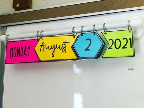 Annette | 6th Grade Math on Instagram: “Do yourself a favor… hang your calendar and you will never have to make a new one! It’s literally my favorite thing in my classroom! What…” Classroom Table Names, Classroom Table, 6th Grade Math, Class Displays, Attention Grabbers, Classroom Tables, Hanging Calendar, Table Names, New Classroom