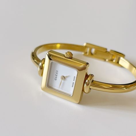 SOLD** Gucci gold plated bangle watch from the 90s Antique Gold Watches Women, Gold Bangle Watch, Gucci Watch Women, Vintage Watches Women, Bangle Watches, Gold Watches Women, Gucci Watch, Gold Plated Bangles, Womens Watches Luxury