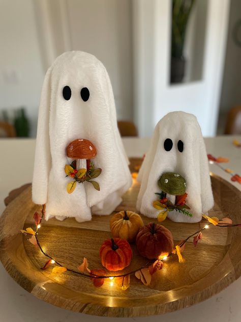 Thank you for visiting! I made these from scratch to enjoy for the Halloween season! Spice up your fall decor with these cute ghosts or even your office desk for the holiday. The small ghost is 8.5 inches tall and the medium ghost is 12 inches tall. If you would like to have both- please add each option to your cart and then checkout. You can choose which color pumpkin you want each ghost to hold (view the images to see the 3 options). Please keep out of children's reach as it is only for display and can be fragile. Also please know the fabric may shed just alittle bit. Thank you! Halloween Mushrooms Decor, Cute Ghost Decor, Ghost Fall Decor, Mushroom Fall Decor, Halloween Desk Decorations, Cute Ghost Centerpieces, Medium Ghost, Ghost Kitchen Decor, Table Halloween Decor