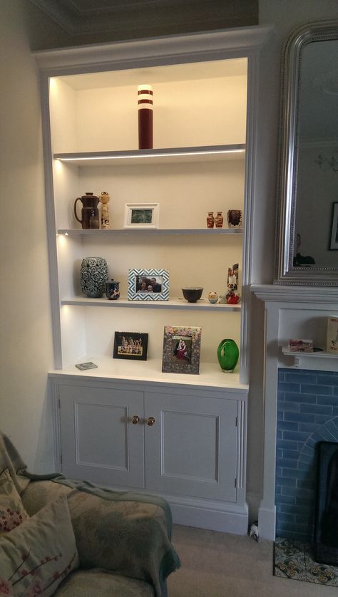 Traditional face-framed alcove unit with fluted pilasters and LED lighting in shelves. Built by Treedom. Alcove Shelves Lighting, Alcove Shelving With Lights, Alcove Shelves With Lights, Built In Led Lights, In Cabinet Lighting, Cabinet Lighting Ideas, Alcove Storage Living Room, Living Room Built In Cabinets, Alcove Lighting