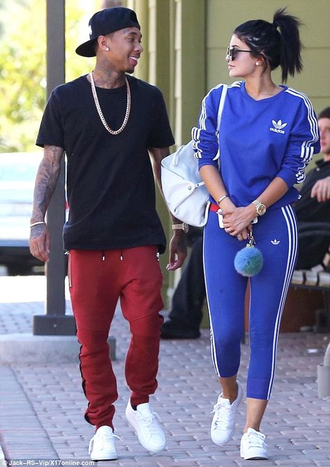 Smitten: Tyga, 25, gazed lovingly at his younger girlfriend Kylie Jenner Tyga, Tyga And Kylie, Kylie Jenner Outfits Casual, Looks Adidas, Look Kylie Jenner, Kardashian Kylie Jenner, Looks Kylie Jenner, Trajes Kylie Jenner, Estilo Kylie Jenner