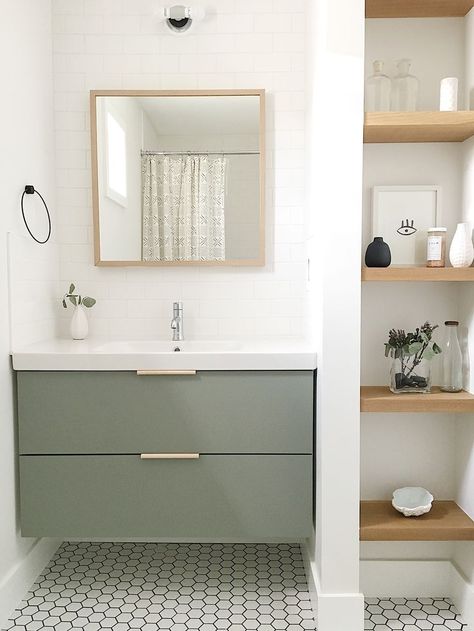 The guest bathroom utilizes a simple Ikea vanity custom painted to the perfect shade of green and features leather hardware from the Australian company Made Measure. Drømme Bad, Design Interior Baie, Guest Bathroom Design, Ikea Vanity, Green Vanity, Ikea Bathroom, Decor Ikea, Bad Inspiration, Decor Baie