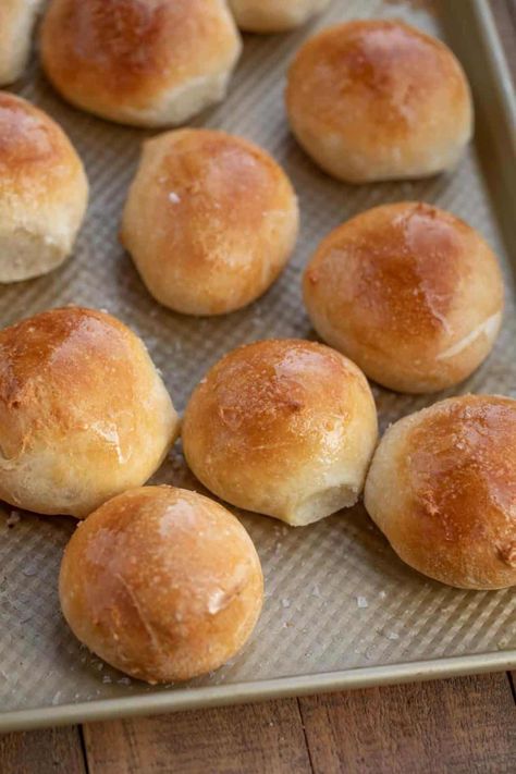 French Bread Rolls are the PERFECT yeast bread to serve on the weekend because they're warm and fluffy on the inside, crusty on the outside, and incredibly easy to make! #frenchbread #rolls #dinner #sidedish #crusty #holidays #christmas #thanksgiving #easter #dinnerthendessert French Bread Rolls, Crusty Bread Rolls, Rolls Dinner, Easy Yeast Rolls, Dinner Roll Recipe, Crusty Bread Recipe, Yeast Rolls Recipe, French Dinner, Bread Rolls Recipe