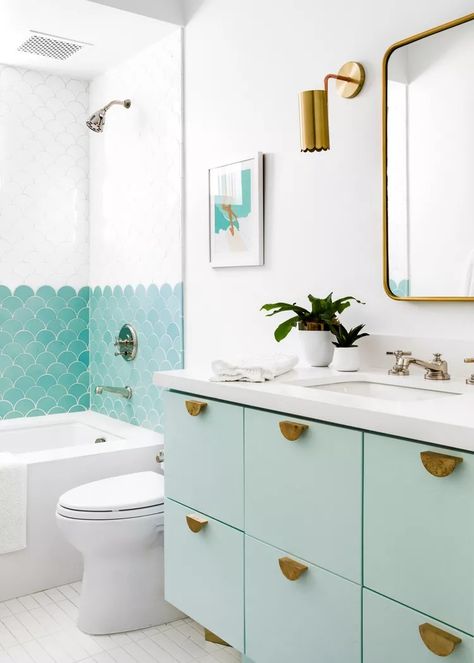 12 Stylish Midcentury Modern Bathroom Ideas Mcm Bathroom Vanity Lighting, Tiny Mid Century Bathroom, Blue Mid Century Bathroom, Bathroom Blue Accents, Pink Mid Century Bathroom, Bathroom Remodel Mid Century Modern, Mcm Bathroom Remodel, Colorful Vanity Bathroom, Mcm Bathroom Ideas