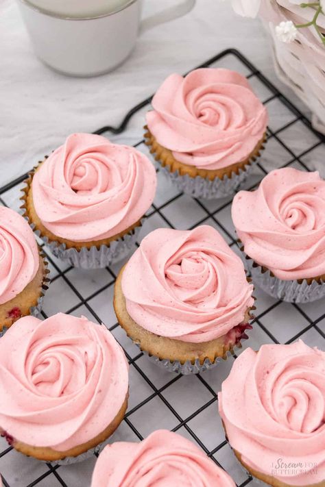 Delicious raspberry cupcakes topped with a rich raspberry buttercream frosting. These soft-textured treats are perfect for anyone who loves fruity, flavorful desserts. Raspberry Vanilla Cupcakes, Vanilla Raspberry Cupcakes, Raspberry Buttercream Frosting, Raspberry Frosting, Raspberry Cupcakes, Raspberry Buttercream, Cupcake Pans, Filled Cupcakes, Rose Cupcakes