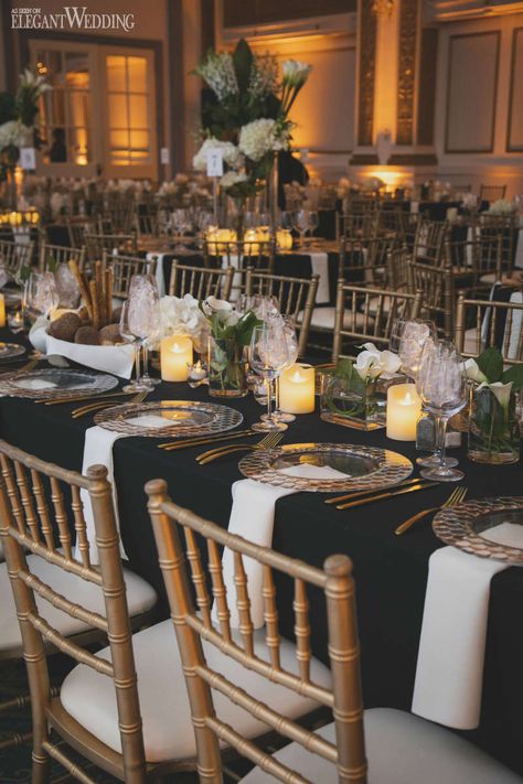 Black Silver Gold Table Setting, Black Wedding With Gold Accents, Black And Gold Wedding Place Settings, Black And Gold Place Setting Wedding, Gold And Black Wedding Table Setting, Black Gold And Glass Wedding, Gold White Wedding Table Setting, Gold Chivari Chairs Black Table Cloth, Black And Cream Table Setting