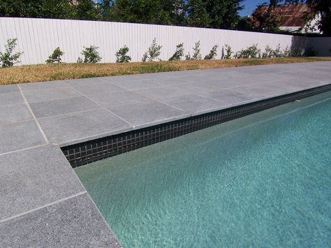 Dark Pavers Around Pool, Grey Pool, Pool Paving, Rectangle Pool, Pool Pavers, Swimming Pool Decks, Outdoor Renovation, Swimming Pool Landscaping, Swimming Pool Tiles