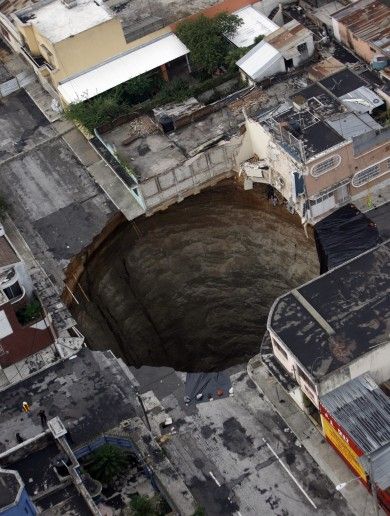 What causes a sinkhole? Hole In The Ground, Guatemala Travel, Guatemala City, Natural Phenomena, Science And Nature, Natural Disasters, Amazing Nature, Natural Wonders, Geology