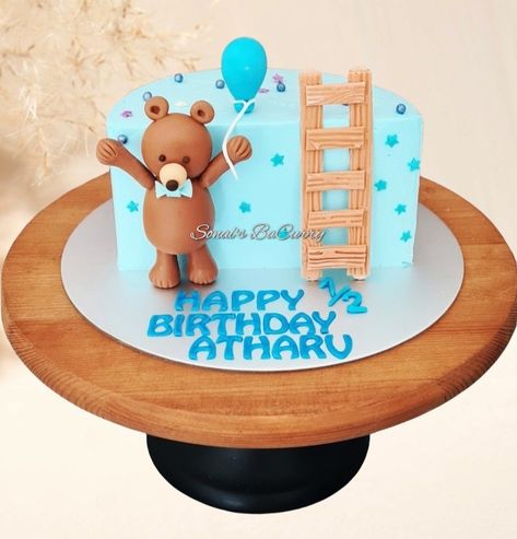 Halfway to one! Chocolate cake with handcrafted fondant toppers Half Year Birthday Cakes, Halfway To One Photoshoot, Halfway To One Cake, Half Way To 1, Half Birthday Baby Boy, Month Birthday Ideas, Halfway To One, Half Birthday Cake, Six Month Birthday