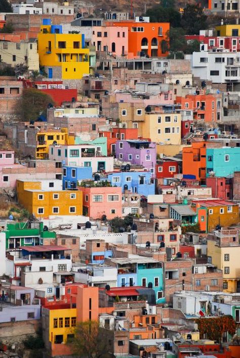 It makes sense that this city is filled with many artists since just about every house sports a different color. Visitors can take a cable car up and down the hill to take in the views without working up a sweat. Spanish Towns, Colourful Buildings, Visit Mexico, Mexico Travel, Oh The Places Youll Go, World Heritage Sites, House Colors, Rio De Janeiro, Sale Poster