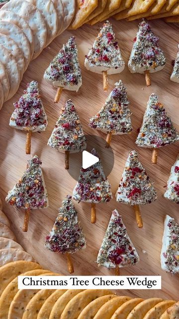 Alisha Larson on Instagram: "Christmas Tree Cheese Wedge 🎄 I absolutely love how elegant these look & perfect for hosting this Holiday season! ❤️

Ingredients:

Feel free to mix it up & use seasonings of choice! I love a good sweet & savory moment! ⬇️

✨Cheese Wedges
✨Red Pepper Flakes 
✨Garlic Salt
✨Italian Seasoning
✨Dried Cranberries (chopped fine) (could also use pomegranate seeds as well)
✨Fine Pretzel Sticks
✨Assorted Crackers 

Directions:

1. Mix seasonings of choice together on a small plate.

2. Unwrap cheese wedge and dip front of cheese in seasoning mix.

3. Break a pretzel stick in half and stick a very small portion of the pretzel into the bottom of the cheese wedge.

4. Place on serving board and serve with assorted crackers.

ENJOY!! 😋

#christmastrees #easyrecipes #holid Cheese And Crackers Christmas Tree, Christmas Tree Cheese Wedge, Cheese Wedge Christmas Trees, Xmas Tree Appetizer, Christmas Tree Cheese Wedges, Christmas Tree Potatoes, Cheese Trees, Christmas Cheeseboard, Christmas Tree Cheese