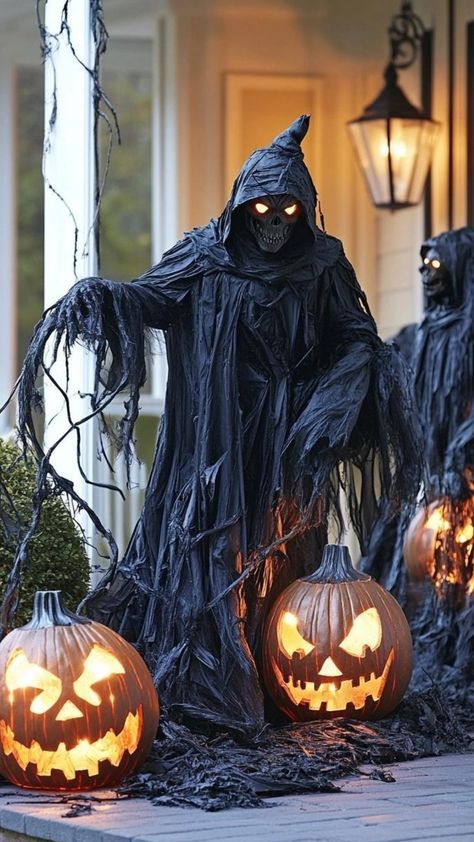 Craft an ethereal display with these ghostly outdoor Halloween decorations. Create floating specter effects using sheer white fabric and fishing line. Position cool-toned LED lights to illuminate your ghosts from within. Scatter wispy, white-painted branches throughout your yard. Use a fog machine to create a misty atmosphere. Hang wind chimes for an eerie soundtrack. These otherworldly outdoor Halloween decorations transform your space into a hauntingly beautiful ghostly gathering. Yard Ideas For Halloween, Witch Theme Decorations, Halloween Backdrop Ideas, Haunted Trail Ideas, Sleepy Hollow Halloween, Scary Halloween Decorations Outdoor, Painted Branches, Outdoor Halloween Decorations, Halloween Outside