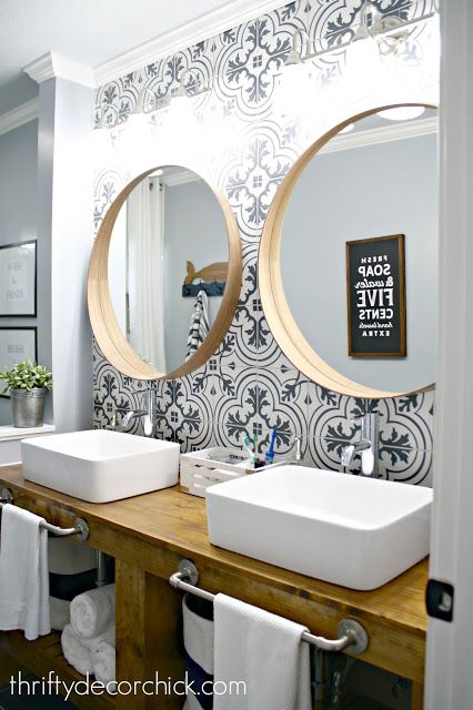 See all my bathroom renovations over the years - the good, bad, and ugly!  Thrifty Decor Chick Bathroom Cement Tile, Bathroom Cottage, Thrifty Decor Chick, Scandinavian Bathroom, Bad Inspiration, Modern Farmhouse Bathroom, Tile Wall, Trendy Bathroom, Wood Vanity