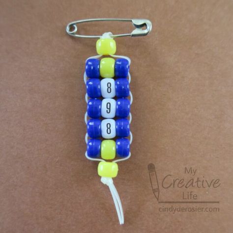 Cub Scout Pack Pride Pin  Scouts can show their pack pride with this easy beading project. Its great for swaps too.  The post Cub Scout Pack Pride Pin was featured on Fun Family Crafts. Cub Scouts Activities, Cub Scout Law, Cub Scout Skits, Cub Scout Popcorn, Boy Scout Crafts, Cub Scout Games, Scouts Activities, Cub Scouts Wolf, Cub Scouts Bear