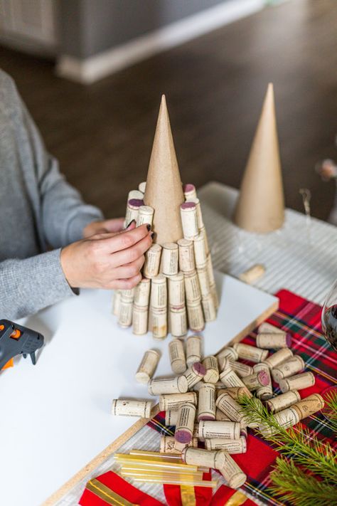 Looking for a fun holiday DIY project that will put all of those extra corks you’ve been saving to good use? Try making this DIY Wine Cork Christmas Tree. Cork Christmas Tree, Wine Cork Christmas, Wine Cork Crafts Christmas, Wine Cork Christmas Tree, Cork Christmas, Cork Crafts Christmas, Cork Christmas Trees, Wine Cork Wreath, Wine Cork Diy Crafts