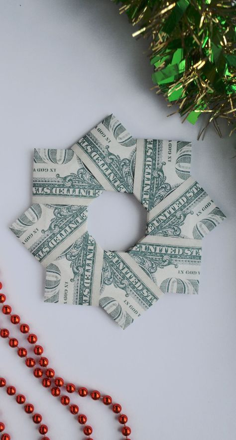 Money Christmas Wreath, Christmas Tree Dollar Bill Origami, Money Wreath How To Make A, Money Folding Ideas Christmas, Origami Money Christmas Tree, Money Star Origami, Christmas Money Origami Easy, Folding Money For Christmas, Folded Money Gifts