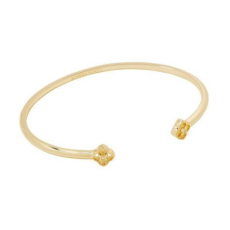 Build up your bracelet stack with the Iris White Cuff Bracelet. White crystal studs bookend a sleek metal cuff for a dazzling shine. An added bonus? The cuff is adjustable, meaning you can customize your fit. Designer, founder, and philanthropist Kendra Scott started her company in 2002, just three months after her first son was born. Her commitment to innovation, quality, customer service, and detail has taken her from a small startup to a billion-dollar brand. Kendra Scott is known for its des