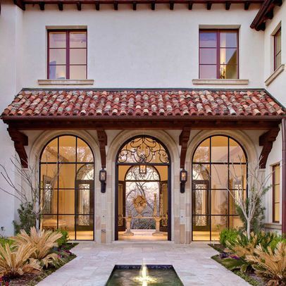 Courtyard Mediterranean, Spanish Style Courtyard, Spanish Courtyard, Indian Houses, Steel Doors And Windows, Mediterranean Villa, Mediterranean Style Homes, Mediterranean Home Decor, Spanish Style Home