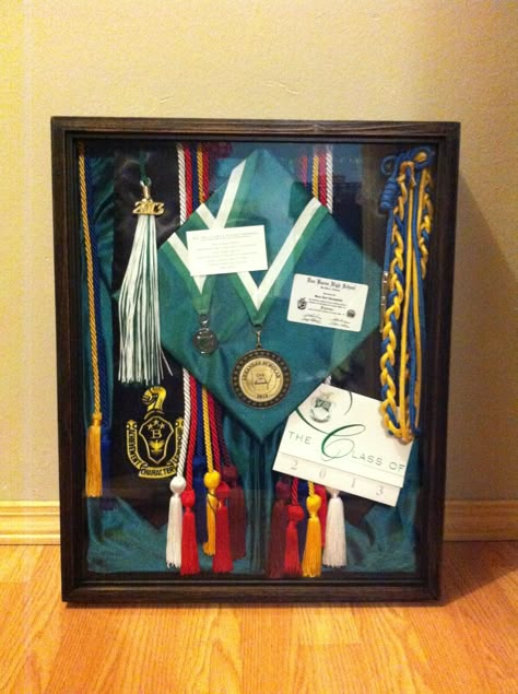 Finally finished the graduation shadow box. After two months, I just now had the time to put it all together. Graduation Shadow Box Ideas, Graduation Shadow, Diy Shadow Box Ideas, Graduation Cords, Shadow Box Graduation, Graduation Display, Graduation Box, Graduation Memories, Diy Shadow Box