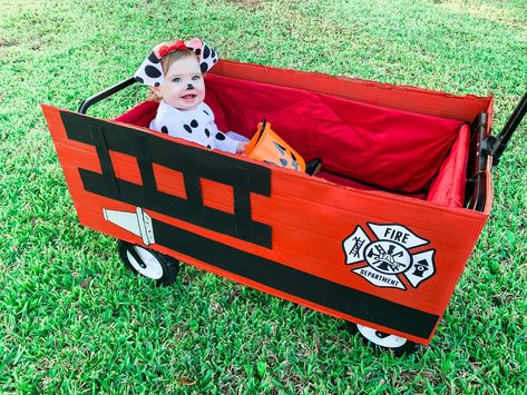 Paw Patrol Wagon Halloween, Diy Halloween Wagon Ideas, Stroller Halloween Costumes For Boys, Fire Truck Halloween Costume, Fire Truck Wagon Halloween, Family Firefighter Halloween Costumes, Diy Wagon Halloween Costume, Baby Wagon Halloween Costume, Wagon Halloween Ideas