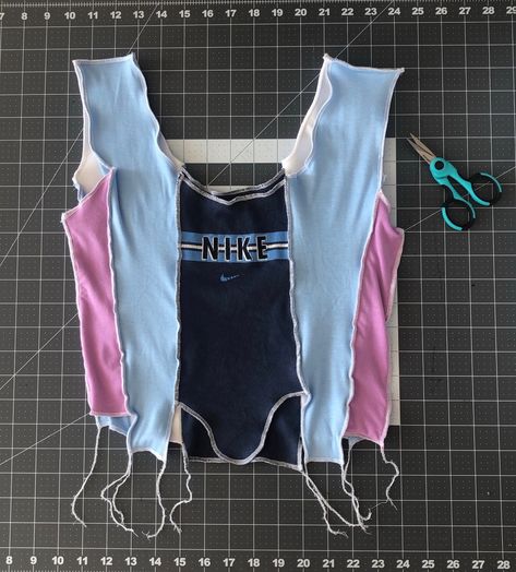 JJVintage Is the Thrifty Label Making Patchwork Tanks Out of Nike Gear | Vogue Reworked Clothes, Nike Gear, Upcycle Clothes Diy, Website Launch, Diy Vetement, Diy Fashion Clothing, Diy Sewing Clothes, How To Make Clothes, Refashion Clothes