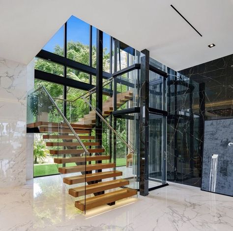 Villa Elevator Interior Design, Staircase Around Lift, Stairs And Elevator Design, Villa Elevator, U Shaped Stairs, Luxury Staircase, Elevator Interior, Hostels Design, Staircase Railing Design