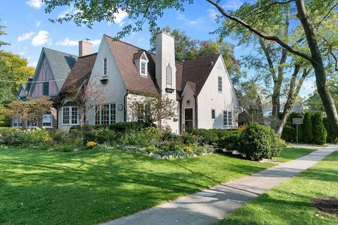 1928 Tudor house in Highland Park, Illinois Highland Park Illinois, Tudor Houses, Wood Columns, Heritage House, Tudor House, 3 Car Garage, House Exteriors, Walk Out, Highland Park