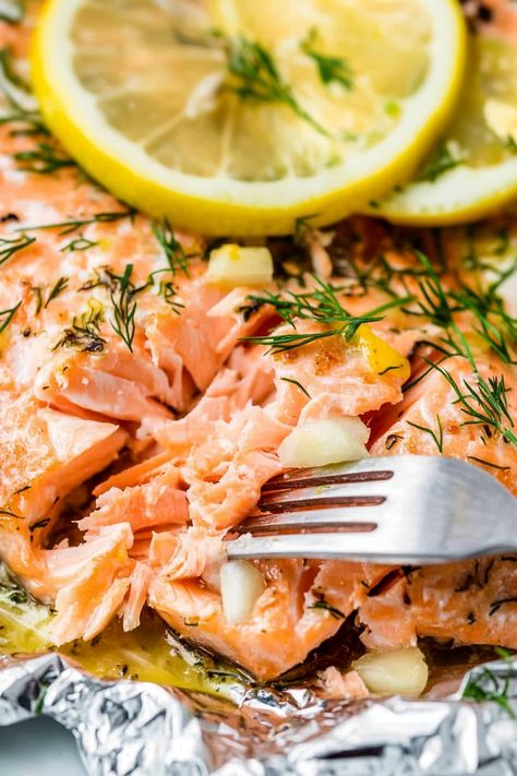 Moist Baked Salmon in Foil Foil Pack Salmon In Oven, Foil Baked Salmon, Salmon In Foil In Oven, Oven Baked Salmon In Foil, Baked Salmon In Foil, Salmon Fillet Recipes, Lemon Butter Salmon, Best Salmon Recipe, Salmon In Foil