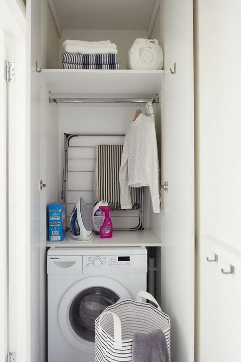 HOUZZ TOUR: Clever Use of Space in a Tiny City Flat - houseology Cushioned Vinyl Flooring, Laundry Cupboard, Small Utility Room, Ikea Interior, Shower Rooms, Utility Cupboard, Tiny Laundry Rooms, Laundry Room Layouts, Laundry Essentials