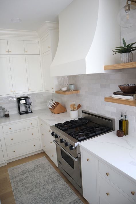 Our Kitchen Backsplash Full Quartz Backsplash, Calacatta Vivo Quartz, Quartz On White Cabinets, Calacatta Laza Quartz Countertop, Calcatta Classique Quartz Kitchen, Cream Cabinets With Wood Range Hood, Mixed Countertops Kitchen Quartz, Calcutta Monaco Quartz, Calacatta Idillio Quartz