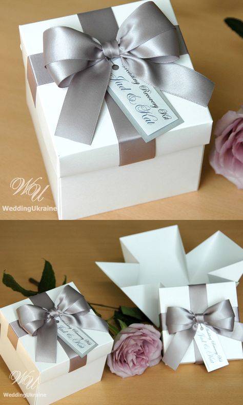 Elegant Silver wedding favor boxes with satin ribbon bow and custom tag, Personalized bonbonniere for gifts and favors for guests. Chic wedding welcome box to thank guests for attending your special day. #giftboxes #personalizedgift #weddingfavour #weddingfavor #weddingboxes #favorboxes #candybox #bonbonniere #weddingparty #weddingdecor #elegantwedding #customdesign #giftboxideas #sweetlove #greywedding #favorboxes #weddingfavorideas #silverweddingdecor #silverwedding #thankyoutag #sweetlove Silver Wedding Favors, Personalized Wedding Favor Box, Wedding Candy Table, Wedding Cake Boxes, Silver Wedding Decorations, Candy Buffet Wedding, Wedding Candy Boxes, Candy Bar Wedding, Wedding Gift Boxes