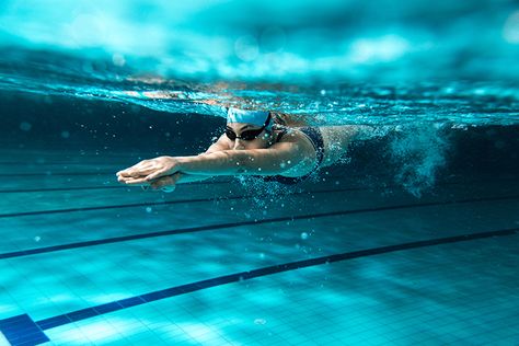 Building a Base for Triathlons | aSweatLife Swimming Program, Female Swimmers, Swimming Benefits, Muscle Abdominal, Pool Workout, Runner's World, Swim Training, Runners World, Swimming Workout