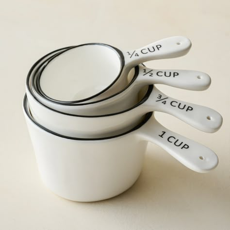 Inspire your love of cooking or baking with beautiful tools like our exclusive Ceramic Black Rim Measuring Spoon Set. Simple and classic, this set of four features a white glaze with a black rim, and its ceramic craftsmanship makes it dishwasher safe. Marble Utensil Holder, Ceramic Measuring Cups, Crochet Cup Coaster, Magnolia Kitchen, Coaster Projects, Wood Spice Rack, Pinch Bowls, Glass Measuring Cup, Ceramic Canister