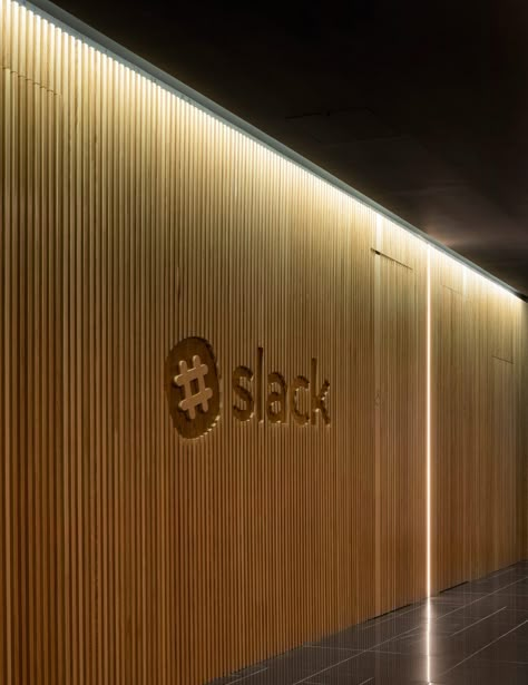 SLACK European HQ by ODOS Architects Office Signage, Office Logo, Corporate Office Design, Office Lobby, Reception Desks, Office Entrance, Office Branding, Office Reception, Logo Wall