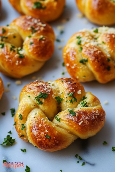 Uncover the secrets behind creating Italian-American Garlic Knots, a delectable and simple-to-prepare appetizer or side. These airy, rich garlic knots make for an ideal complement to any dining experience, boasting a savory taste that appeals to all. Effortlessly impress your guests by serving these scrumptious treats at your next gathering! Garlic Knots Recipe From Scratch, Garlic Knots Pizza Dough, Easy German Chocolate Cake, Italian Main Dishes, Italian Side Dishes, Italian Snacks, Finger Food Desserts, Italian Recipes Appetizers, German Chocolate Cake Recipe