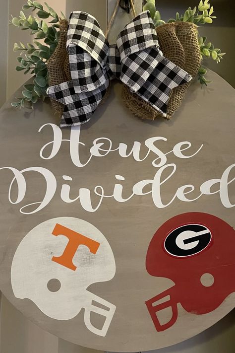 House divided, hearts united. In today’s post, I’m sharing 30 of the best ideas when it comes to house divided football decor. These ideas cover everything from wall hangings, outdoor decor, door hangings, welcome mats, and other super cool finds. The best part - they all feature more than one football team! Get ready for some fun and colorful ideas to spruce up your home and showcase your family’s love of the game. Tap or click to keep reading! House Divided Football, Football Door Hangers, Football Diy, Football Crafts, Football Decor, Cool Finds, Door Hangings, Football Signs, Football Wreath