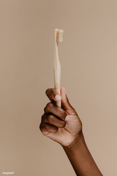 Black hand holding a wooden toothbrush | premium image by rawpixel.com / McKinsey #picture #photography #inspiration #photo #art #toothbrush Dentist Branding, Wooden Toothbrush, Sikat Gigi, Toothbrush Storage, Dental Art, Tooth Brush, Bamboo Toothbrush, Hand Holding, Bag Trends