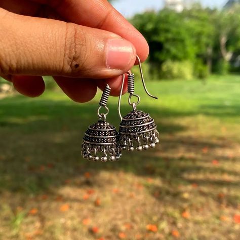 Prettiest jhumka are in stock now 🛒 So Order Yours via Dm 📩 & share your Lovely response with us 💗 . 🎀Premium quality 🚛Shipping pan india 🇮🇳 ⏰ Delivery within 7-10working days . (Jhumka, mini jhumka, gift for her, affordable jewellery, oxidised jewelleries, silver jewellery) . #jhumkaearrings #ethicjewelry #minifashionista #earringlover #smallbusinessbts #smallbizlove #shoppingonline #localforvocalindia #internationaljewellery #silverjewellery Did you check out our new post ??? Small Jhumkas Silver, Traditional Silver Jhumkas As A Gift, Festive Handmade Silver Jhumkas, Traditional Sterling Silver Jhumkas As Gift, Mini Jhumka, Festive Sterling Silver Drop Jhumkas, Desi Jewelry, Jhumka Earrings, Oxidised Jewellery