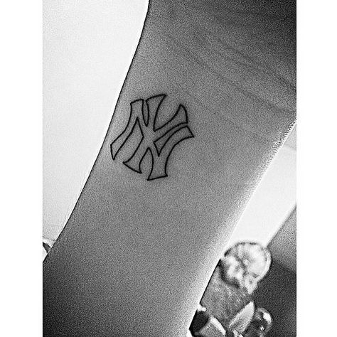 Wrist tattoo of the New York Yankees logo. Tattoo Artist: Jon Boy · Jonathan Valena Made In Ny Tattoo, New York Yankee Tattoo Ideas, Yankee Logo Tattoo, New York Yankees Tattoo Ideas, Yankee Tattoo For Women, Ny Yankees Tattoo, Yankees Tattoo Ideas, Yankees Logo Tattoo, Ny Tattoo Ideas