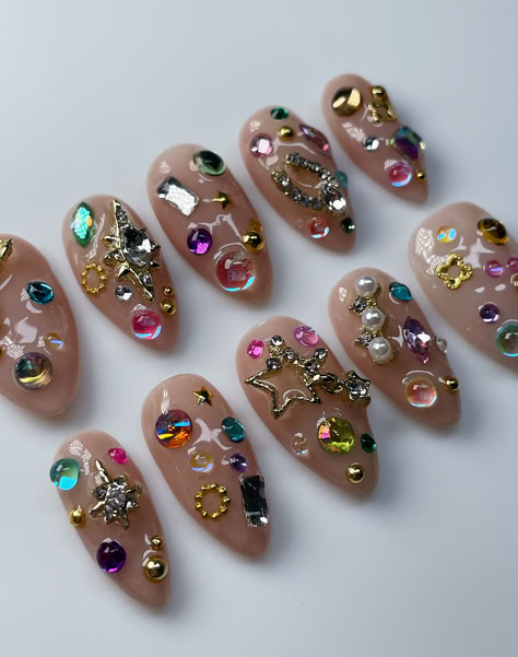 Nails with rhinestones all over, Nails with gems all over, Junk nails, Nude nails with gems, Maximal nail inspo, maximal nail art, rainbow gem nails, innerbloom nails Junk Nails, Mani Ideas, Nail Jewels, Glamorous Nails, Nails Only, Gem Nails, Press Ons, Maximalism, Nail Art Ideas