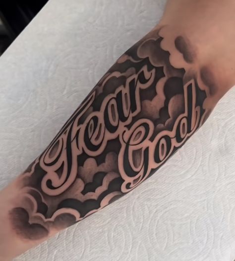 Cloud Bicep Tattoo Men, Inner Bicep Tattoos For Men, Writing Tattoos For Men Arm, Writing On Forearm Tattoo, Word Sleeve Tattoo, God Shoulder Tattoo Men, Cloud Tattoo Sleeve For Men Forearm, Name With Clouds Tattoo, Cloud Arm Sleeve Tattoo