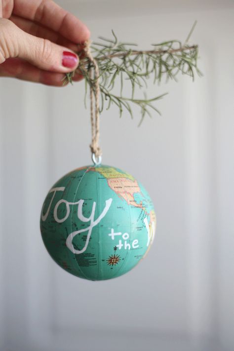 World Ornaments Diy, Joy To The World Christmas Tree, Globe Ornaments Diy, Globe Ornaments Diy Kids, Globe Christmas Ornament, Earth Ornaments Diy, Cricut Ornaments Diy, Travel Themed Christmas Tree Ornaments, Joy To The World Ornament