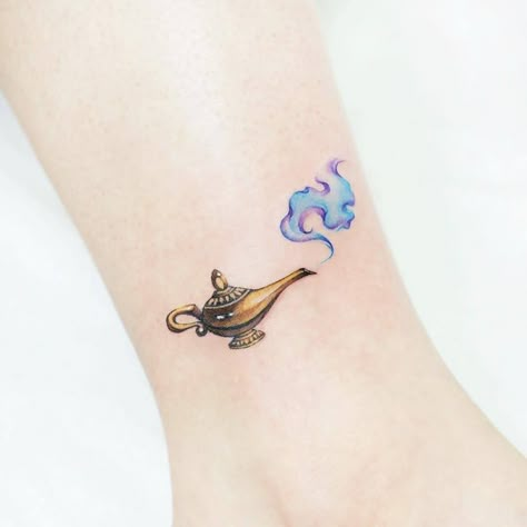 Genie Lamp Tattoo, Genie Tattoo, Aladdin Tattoo, Infinity Tattoo With Feather, Lamp Tattoo, Ankle Tattoo Designs, Sigil Tattoo, Genie Lamp, Disney Tattoos