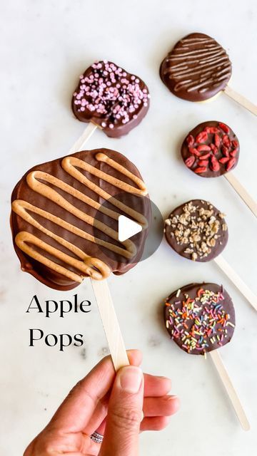 Stephanie Niemis on Instagram: "These Apple Pops are a fun treat to make with the kids! All you need is an apple, chocolate, and your favorite toppings! They have become a fall favorite here!

✨Apple Pops✨
Ingredients:
🍎 1 large apple
🍎 1/2 cup dark chocolate, melted
🍎 favorite toppings: nut butter, caramel sauce, sprinkles, dried fruit, granola, chopped nuts, etc
🍎 6 popsicle sticks
Directions:
1. Slice 2-3 slices to the left and right of the stem (they should be about 1/2 in wide so the popsicle stick can go through without breaking the slice).
2. Use a knife to make a small slit at the bottom of each slice. Then insert a popsicle stick through the slit.
3. Dip in melted chocolate, place on a baking sheet lined with parchment paper, add desired toppings, and place in the fridge to ha Butter Caramel Sauce, Apple Pops, Apple Chocolate, Fruit Granola, Stovetop Chicken, Apple Pop, Recipes Skillet, Butter Caramel, Sugar Free Chocolate Chips