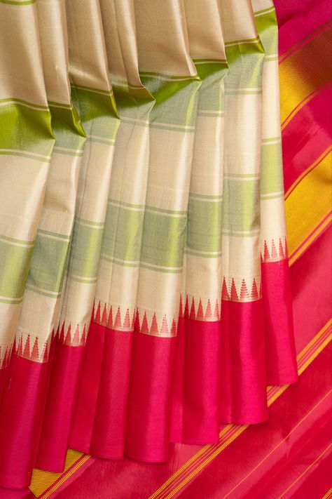 This everyday-wear Almond Cream Stripes Korvai Pure Kanchipuram Silk Saree features cream and green stripes, a striking magenta korvai border, and is crafted from Pure Kanchipuram silk for comfort and durability, without the use of zari for a stylish, sophisticated aesthetic. Madras Checks, Checks And Stripes, Kanchi Sarees, Sari Design, Almond Cream, Sophisticated Aesthetic, Kanchipuram Silk Saree, Soft Silk Sarees, Office Parties