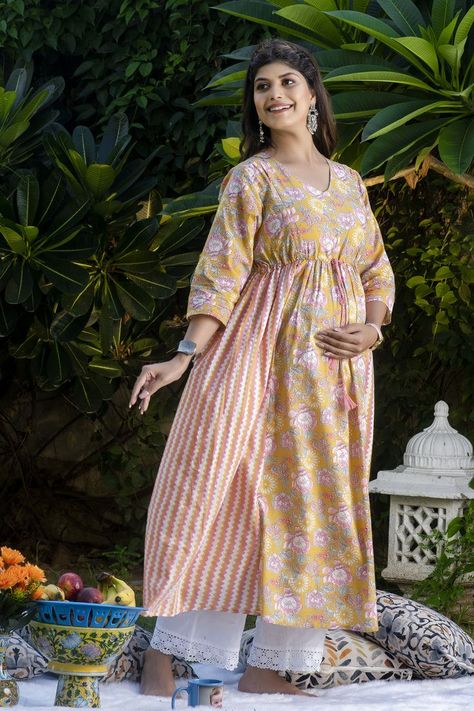 🤰🏻Fabric-BREATHABLE COTTON fabric🤰🏻CONCEALED ZIPS on both sides.🤰🏻Colour-blue and white🤰🏻Fits during and post pregnancy🤰🏻 Colour -mustard and pink🤰🏻 Feeding friendlyThe ultimate essential, your wardrobe is not complete without this beautiful maternity and nursing kurta. Made in soft cotton and cut for a relaxed fit, this dress drapes beautifully over your curves allowing space for movement. Featuring long 3/4th sleeves and concealed zips on both sides. Feeding Dress Pattern Indian, White Fits, Mom Wardrobe, Dress Drape, Casual Maternity, Post Pregnancy, Pregnancy Outfits, Maternity Wear, Nursing